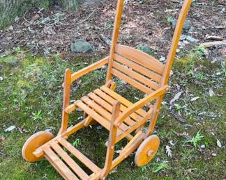 Vintage child's push-seat...