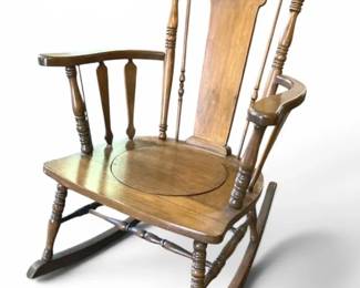 Oak Rocking Chair with Intricate Carved Details