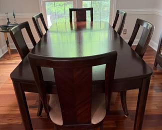 Beautiful dining room table with extra leaf and 6 chairs