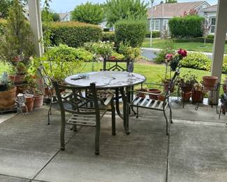 patio set and potted plants