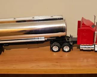 Red Semi Truck with Chrome Tanker