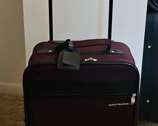 Maroon Rolling Suitcase
