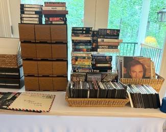 tons of DVDs, CDs, a track, cassettes