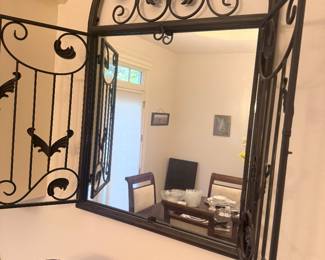 Iron gate wall mirror