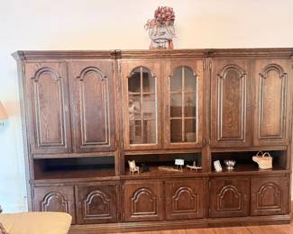 three separate shelf units one is a bar