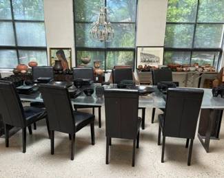 Custom 16 1/2' metal and acrylic dining table and black leather chairs