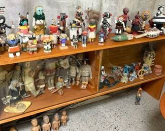 Display cabinet with kachinas, folk art and antique Alaskan dolls