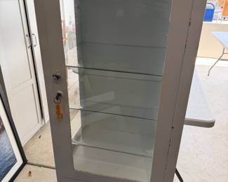 Vintage metal apothecary cabinet
