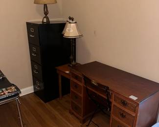 Desk, filing cabinet, and lamps