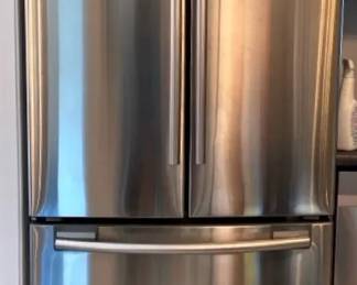 04 Samsung Three Door French Door Refrigerator Featuring A Smudge Proof Stainless Steel Finish And Bott