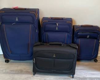 Travel Pro 3 Piece Blue Rolling Luggage Set W Black Rolling Garment Bag