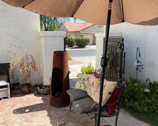 Patio Sofa, Umbrella And Fireplace