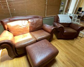 Brown leather couch set including 2 sofas, 1 love seat, 1 captains chair, and 2 ottomans. Items can be sold separately or all together.