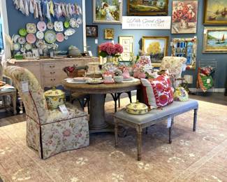 Designer showroom featuring one of our handmade rugs styled in a beautifully curated interior.