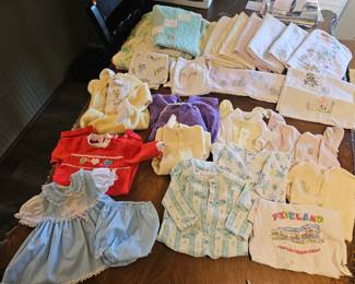 Assortment of late 1970s and early 1980s baby clothing, etc.
