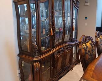 China cabinet.  Lights up both top and bottom.  Bought new at RC Willey's.