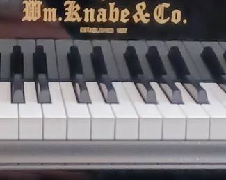 Wm. Knabe @ Co baby grand piano.