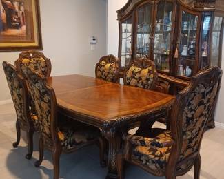 Table has 3 additional leaves.