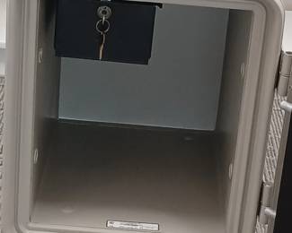Fire safe.  Combination with additional drawer with key.