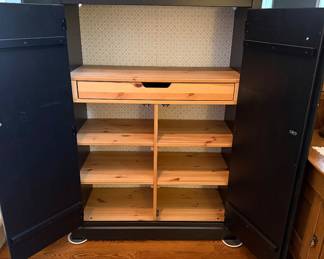 Inside of Ikea black cabinet Desk or Art Storage