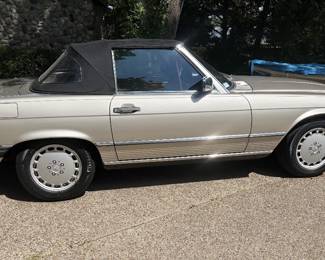 Top Configuration: Came standard with both a removable body-colored hardtop and a folding soft top