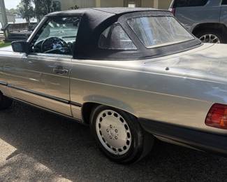 Genuine leather bucket seats, automatic climate control, wood trim, cruise control