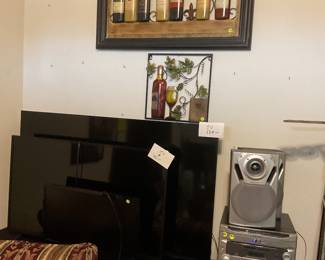 3 TVs , radio and speakers, wall decor