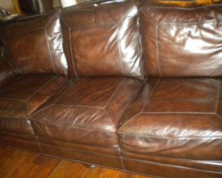 Triple cushion leather sofa