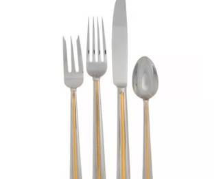Two place settings for 10 plus serving pieces is this Gorham flatware “Golden Brocade”