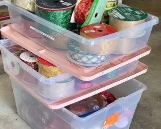Three huge tubs filled to the top with brand new holiday wired ribbon.