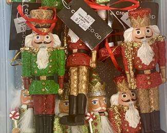 Tub filled with brand new nutcracker ornaments purchased from Teche Drugs