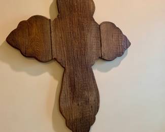 very large wooden cross--a yard across and tall