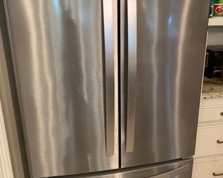 Whirlpool side by side stainless refrigerator