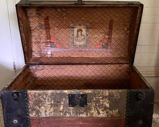 Antique Victorian dome top steamer trunk with interior lithograph