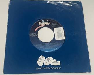 Collection Of Vintage & Contemporary 45s (Some Sealed, Others W/ Protective Bags)