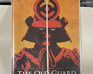 Collection Of Graphic Novels & Comics Books (The Old Guard, The Walking Dead, Steve Aoki, Etc.)