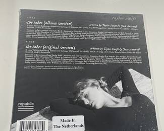 Collection Of Vintage & Contemporary 45s (Some Sealed, Others W/ Protective Bags)