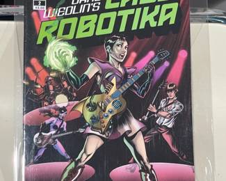 Collection Of Graphic Novels & Comics Books (The Old Guard, The Walking Dead, Steve Aoki, Etc.)