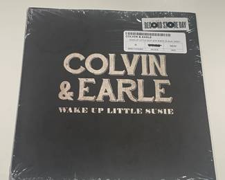 Collection Of Vintage & Contemporary 45s (Some Sealed, Others W/ Protective Bags)