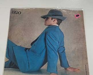 Collection Of Vintage & Contemporary 45s (Some Sealed, Others W/ Protective Bags)