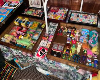 Display Case Assortment Of Vintage Toys