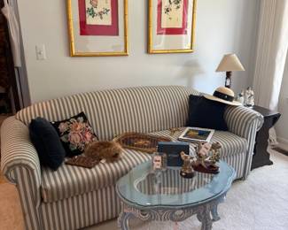 Striped Sofa, Wall Art, Glass Top Coffee Table 
