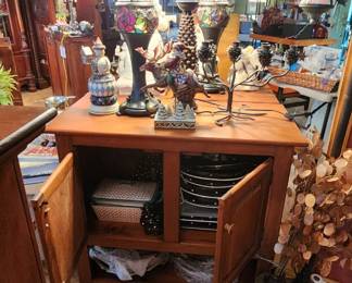 Tiffany style lamps, accent cabinet, and every cabinet has something inside