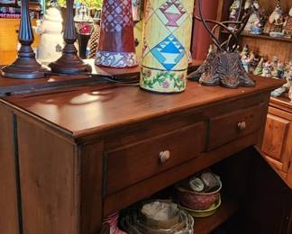 Accent Cabinet filled with Temptations bakeware and serving pieces
