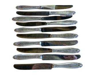 Ten vintage hollow-handle dinner knives