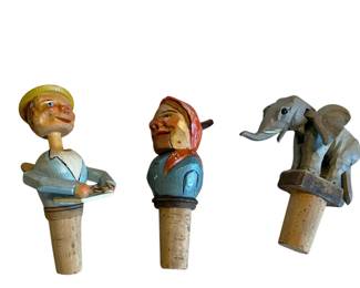 Hand-carved wooden mechanical bottle stoppers
