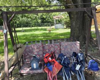 Large outdoor swing. Lots of lawn/patio furniture, etc,