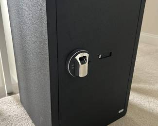 Black Safe with fingerprint and key access. Perfect Condition. Dimensions: Height=21.5 '', Width= 15'', Depth= 14''. Black. You can use either your fingerprint or a key to open the safe. 2 levels inside.