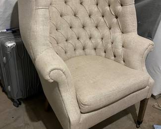 Tufted beige chair from Restoration Hardware. Comes with a matching ottoman. Perfect condition