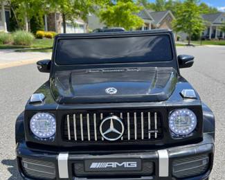 Mercedes-Benz AMG G63. 12V Ride on Car with Remote Control. Plug in Rechargeable Battery. Your child will love this! They can use the remote control or they can ride in it while you use the remote control or they can control it themselves while they ride it by pushing the gas pedal and turning the steering wheel. So much fun!